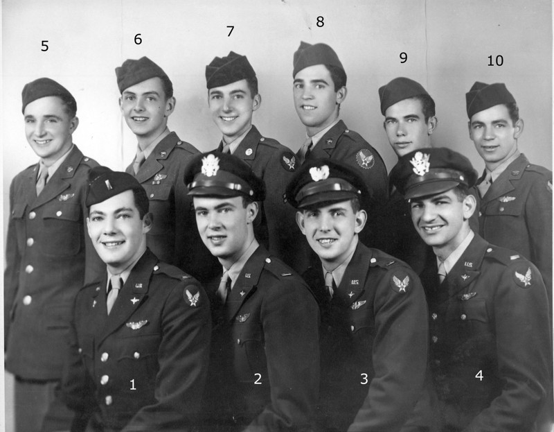 Group portrait of the ten-man crew of the B-24 Marvin's Mad House in dress uniforms, four officers seated in front and six crewmen standing behind, each numbered one through ten.